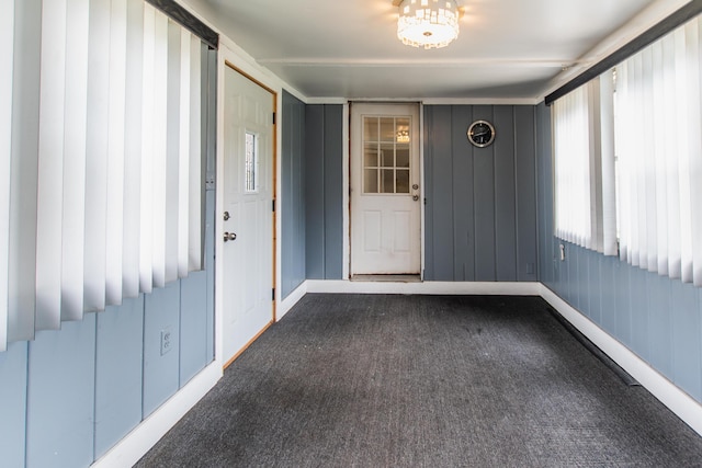 view of carpeted foyer
