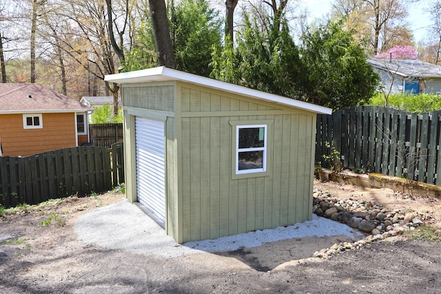 view of shed featuring a fenced backyard