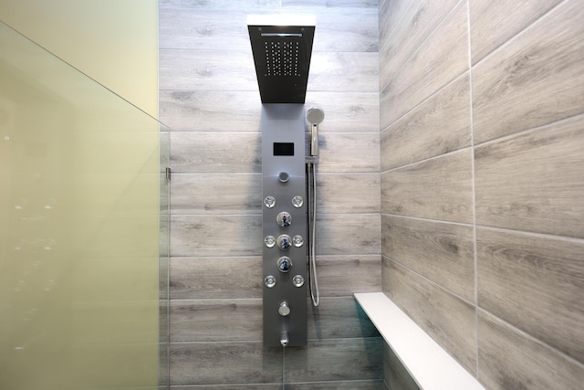details with a tile shower