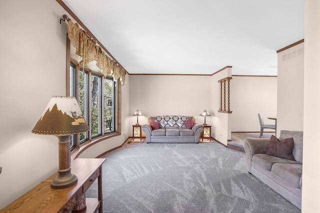 living room featuring crown molding, baseboards, and carpet