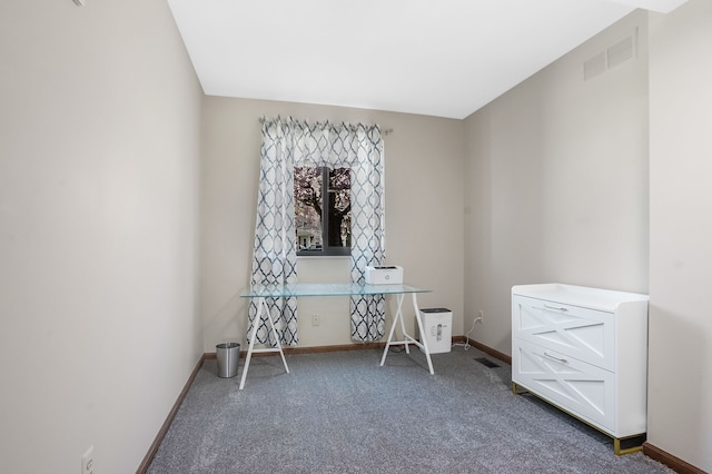 interior space featuring baseboards, visible vents, and carpet