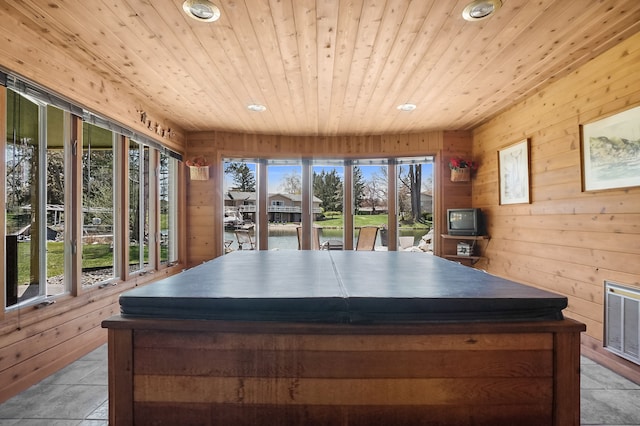 interior space with visible vents and a hot tub