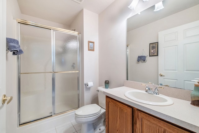 full bath featuring vanity, tile patterned flooring, a shower stall, and toilet