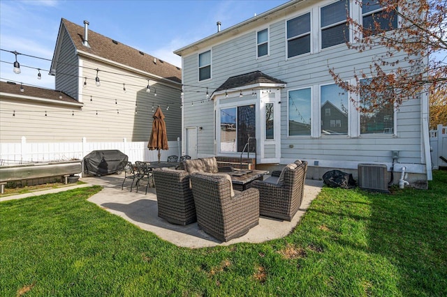 back of property with a yard, a patio, cooling unit, and fence