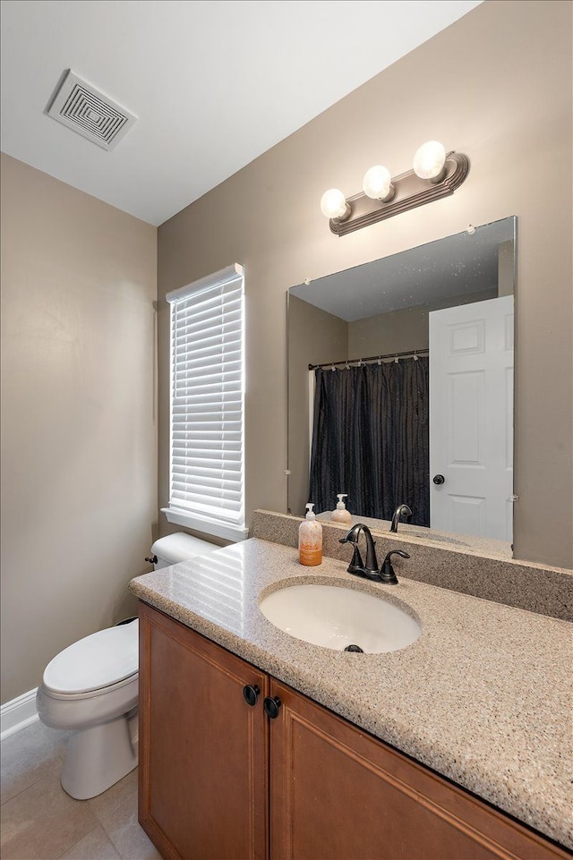 full bath with visible vents, tile patterned flooring, vanity, toilet, and a shower with shower curtain