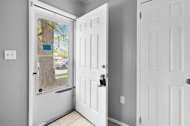 foyer featuring light tile patterned floors