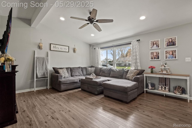 1128 Braeview Dr, Howell, MI 48843 - living area featuring wood finished floors, ceiling fan, recessed lighting, vaulted ceiling, and baseboards