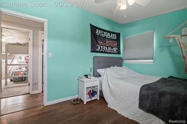 1128 Braeview Dr, Howell, MI 48843 - bedroom featuring wood finished floors, baseboards, and a ceiling fan