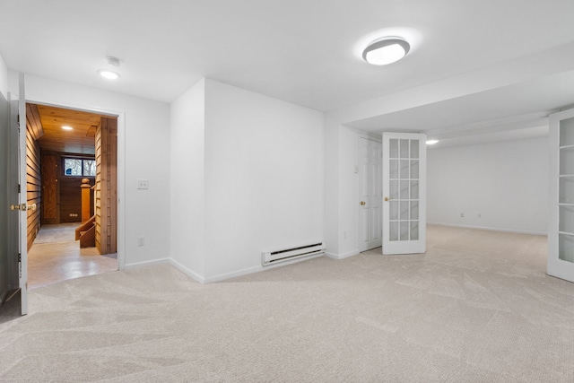 carpeted spare room featuring stairway, baseboards, a baseboard heating unit, and recessed lighting