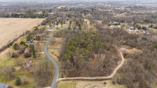 birds eye view of property featuring a rural view