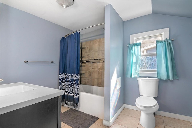full bath with tile patterned flooring, shower / tub combo, baseboards, vanity, and toilet