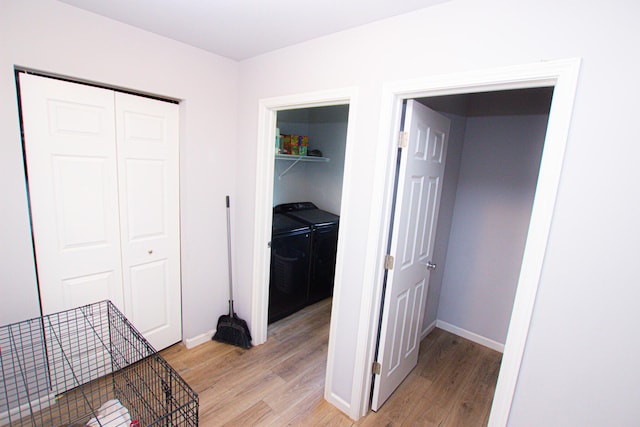 interior space with washing machine and dryer