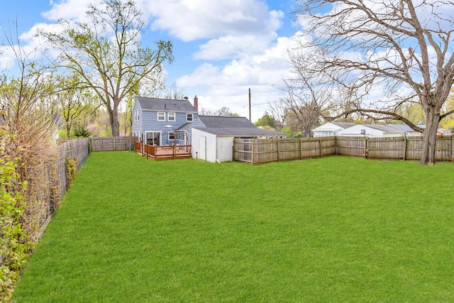 2408 Cobb Rd, Jackson, MI 49203 - view of yard with a wooden deck, a shed, and an outdoor structure