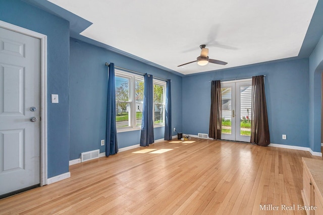 729 E Madison St, Hastings, MI 49058 - empty room with a ceiling fan, baseboards, visible vents, and light wood-style floors