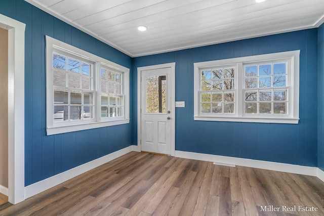 729 E Madison St, Hastings, MI 49058 - entryway featuring a healthy amount of sunlight, baseboards, recessed lighting, and wood finished floors