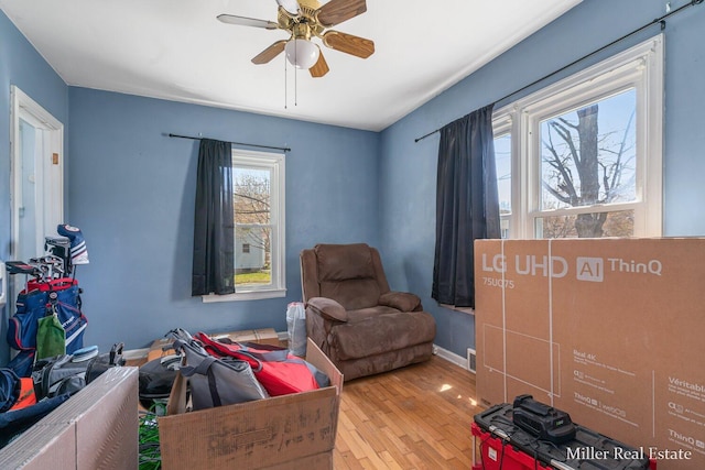 729 E Madison St, Hastings, MI 49058 - interior space with baseboards, a ceiling fan, and hardwood / wood-style floors