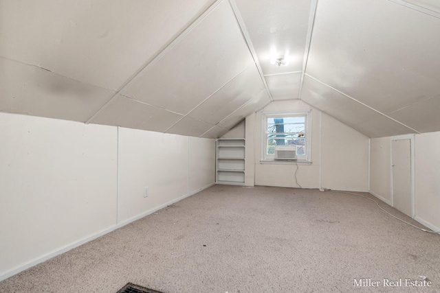 729 E Madison St, Hastings, MI 49058 - bonus room featuring carpet flooring, baseboards, and lofted ceiling