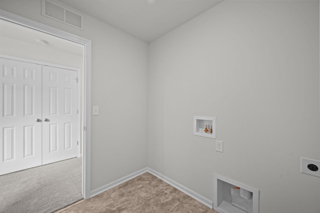 clothes washing area featuring laundry area, washer hookup, baseboards, hookup for an electric dryer, and visible vents
