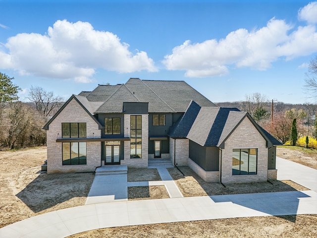 3281 Chickering Ln, Bloomfield Hills, MI 48302 - view of front of house with a shingled roof and brick siding