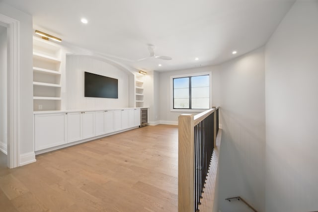 3281 Chickering Ln, Bloomfield Hills, MI 48302 - hallway with an upstairs landing, light wood-style floors, built in features, baseboards, and recessed lighting