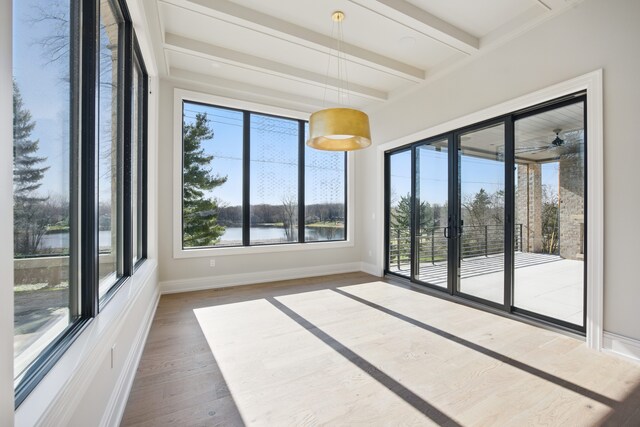 3281 Chickering Ln, Bloomfield Hills, MI 48302 - unfurnished room featuring beamed ceiling, wood finished floors, french doors, baseboards, and a water view