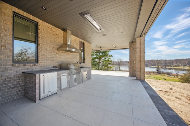3281 Chickering Ln, Bloomfield Hills, MI 48302 - view of patio / terrace featuring an outdoor kitchen, a water view, grilling area, and a sink