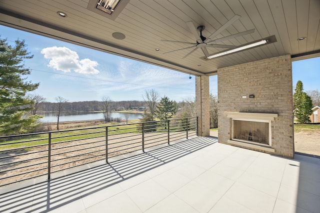 3281 Chickering Ln, Bloomfield Hills, MI 48302 - view of patio / terrace featuring an outdoor brick fireplace, a water view, and ceiling fan