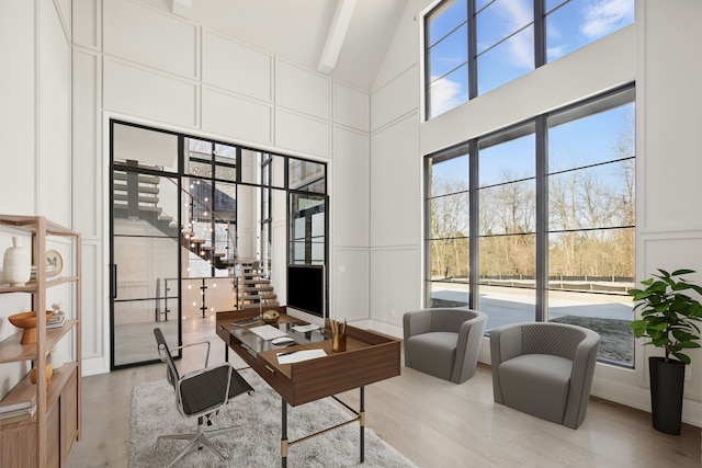 3281 Chickering Ln, Bloomfield Hills, MI 48302 - office featuring wood finished floors, a decorative wall, high vaulted ceiling, and beamed ceiling