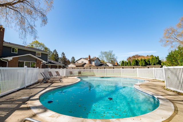 view of pool with a patio, a fenced in pool, and a fenced backyard