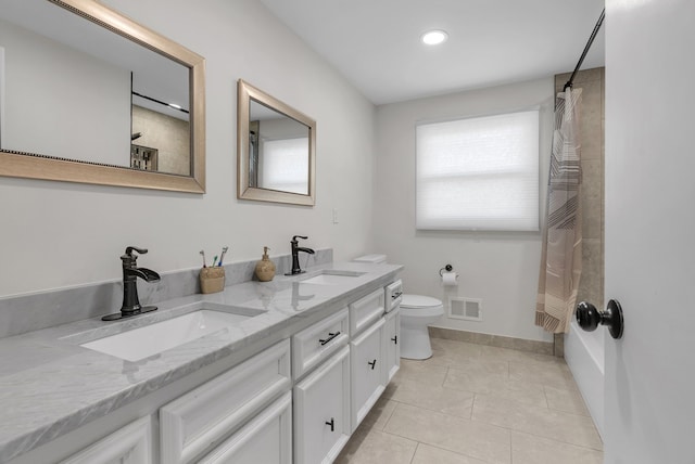 full bathroom featuring a sink, tile patterned floors, toilet, and visible vents