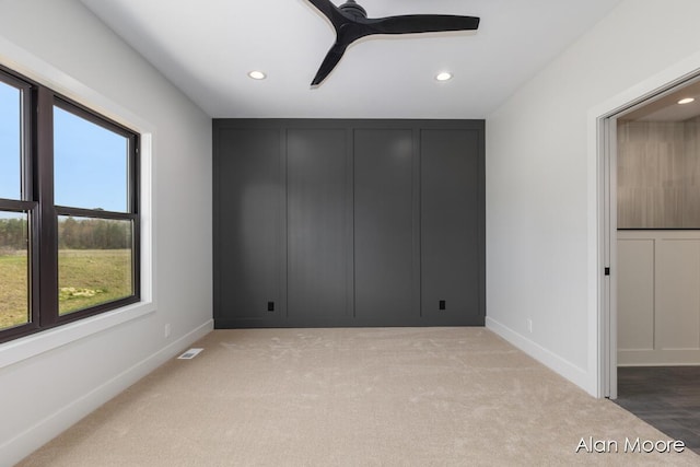 unfurnished bedroom featuring baseboards, recessed lighting, and visible vents