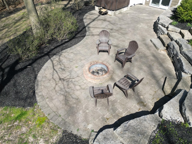 view of patio / terrace featuring a fire pit