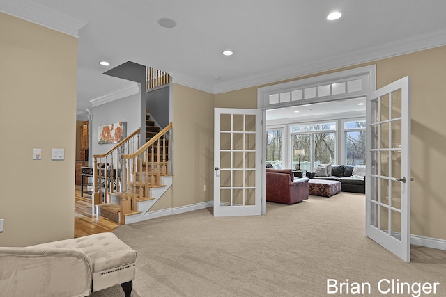 interior space featuring ornamental molding, stairs, recessed lighting, french doors, and carpet
