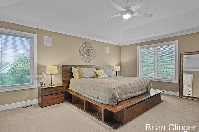 bedroom featuring crown molding, carpet floors, baseboards, and visible vents