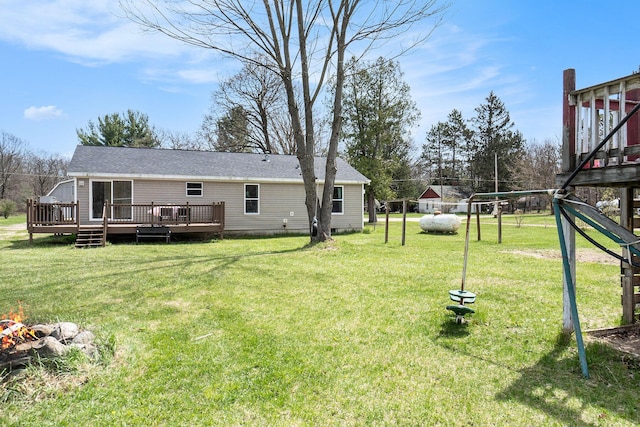 view of yard featuring a wooden deck