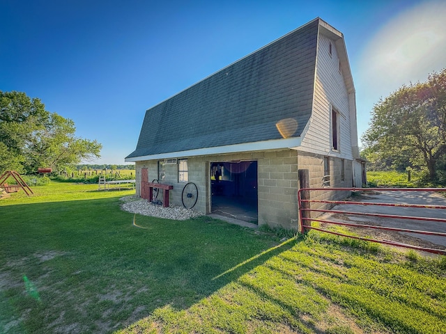 50002 M 51 N, Dowagiac, MI 49047 - exterior space featuring fence, a barn, a shingled roof, a gambrel roof, and a yard