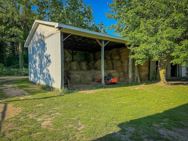 50002 M 51 N, Dowagiac, MI 49047 - view of pole building featuring a lawn and a carport