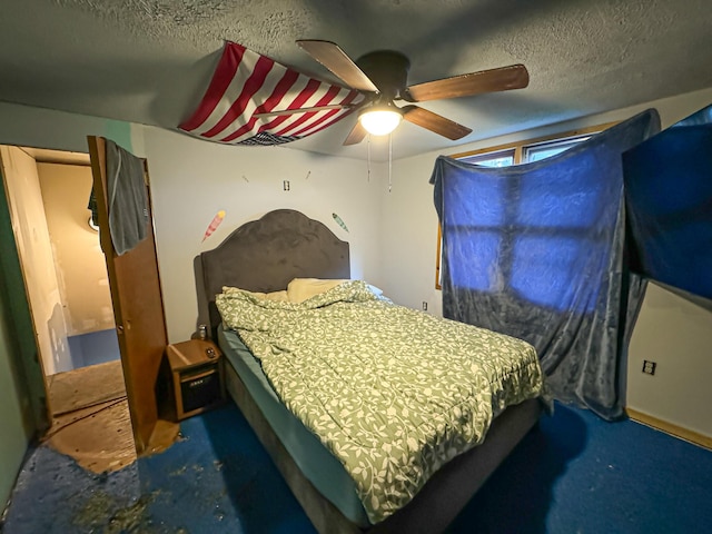 50002 M 51 N, Dowagiac, MI 49047 - bedroom with a textured ceiling and ceiling fan