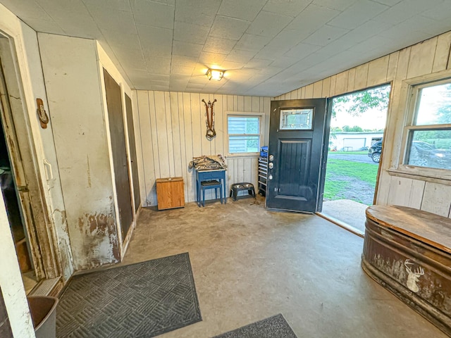 50002 M 51 N, Dowagiac, MI 49047 - foyer with wood walls and unfinished concrete flooring