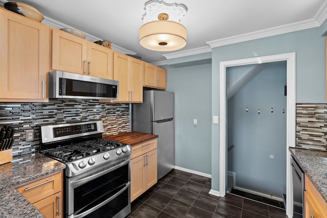 kitchen with crown molding, light brown cabinetry, dark tile patterned flooring, backsplash, and stainless steel appliances