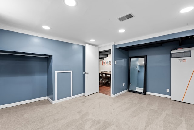 finished basement featuring carpet flooring, recessed lighting, baseboards, and visible vents