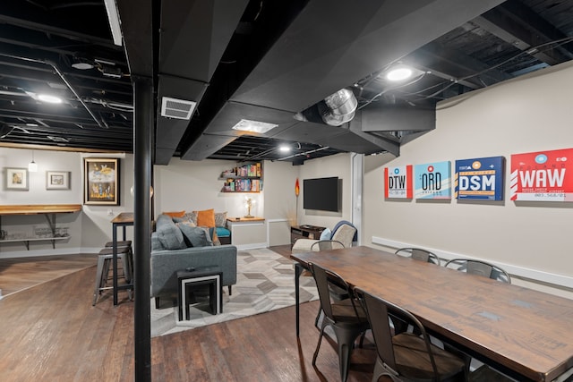 interior space featuring visible vents and wood finished floors