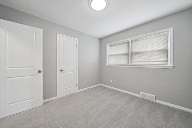9119 Seminole, Redford, MI 48239 - unfurnished bedroom with visible vents, baseboards, and carpet floors