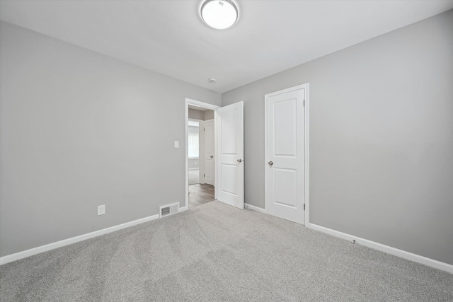 9119 Seminole, Redford, MI 48239 - unfurnished bedroom with visible vents, baseboards, and carpet floors