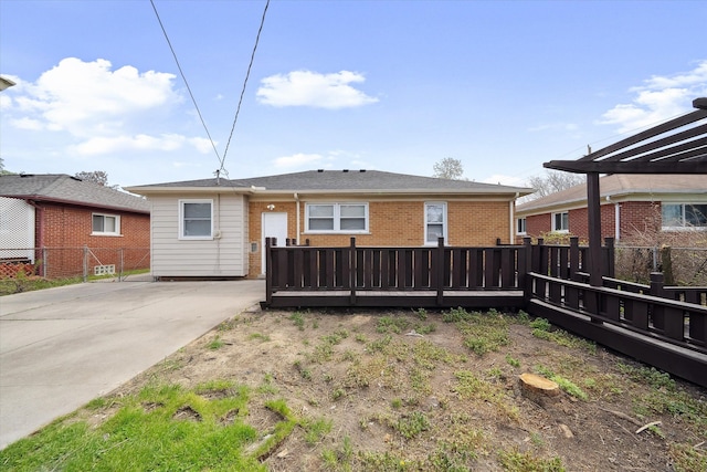 9119 Seminole, Redford, MI 48239 - back of property featuring brick siding, fence, and driveway