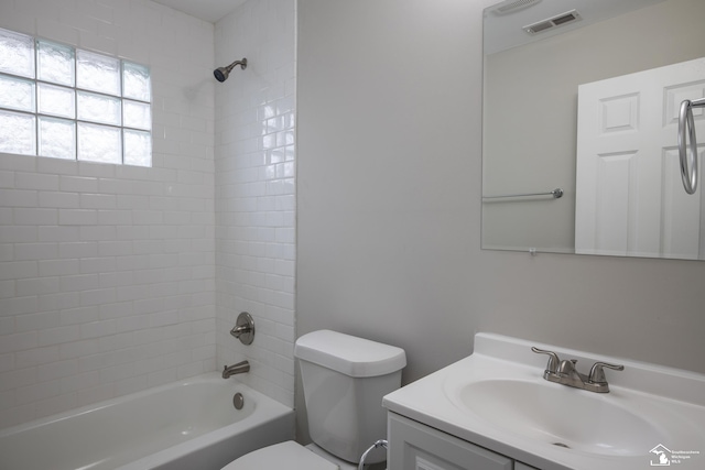 full bathroom featuring vanity, toilet,  shower combination, and visible vents