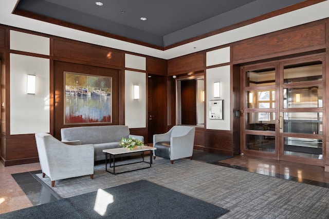 lobby featuring a decorative wall and recessed lighting