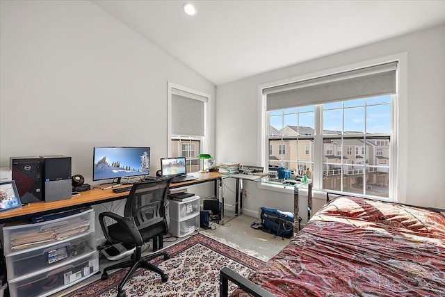interior space featuring baseboards, recessed lighting, and lofted ceiling