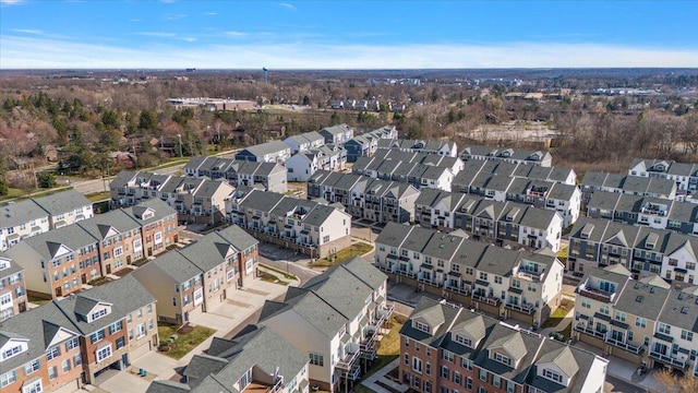 birds eye view of property with a residential view