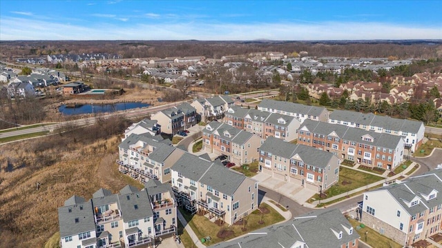aerial view featuring a residential view and a water view
